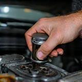 Changing oil in vehicle