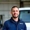 Mike H. at the shop with a fleet van